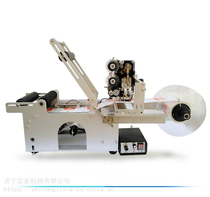 手动不干胶圆瓶贴标机设备操作方便小型贴标机器酒瓶